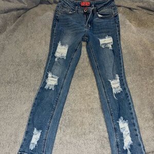 Mid rise skinny ripped blue Jeans